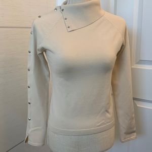 Size S Votre Non like new Almond color Silk& spandex top with snaps design